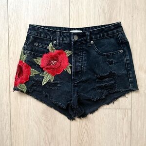Red and Black Distressed Jean Shorts with Floral Design